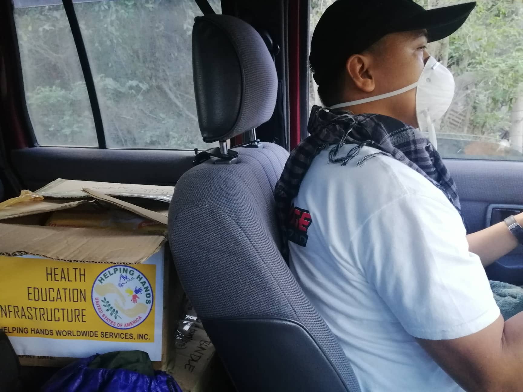 Helping Hands relief goods being delivered to a community